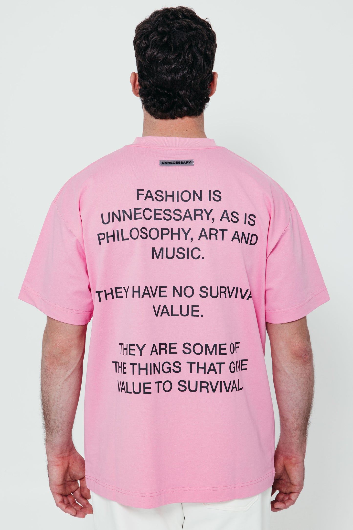 UNNECESSARY Survival T-Shirt | Hot Pink